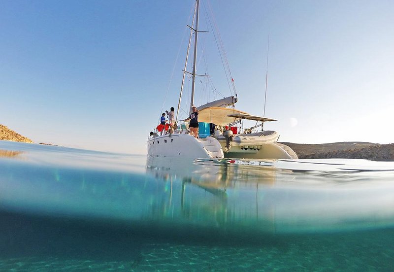 Sailing on a catamaran on a Greek charter yacht