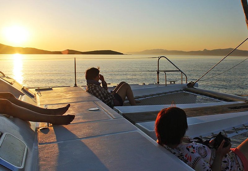 Greek sunset viewed on-board a catamaran