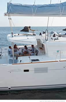 Sailing catamaran Evi - The aft sitting area and flybridge above